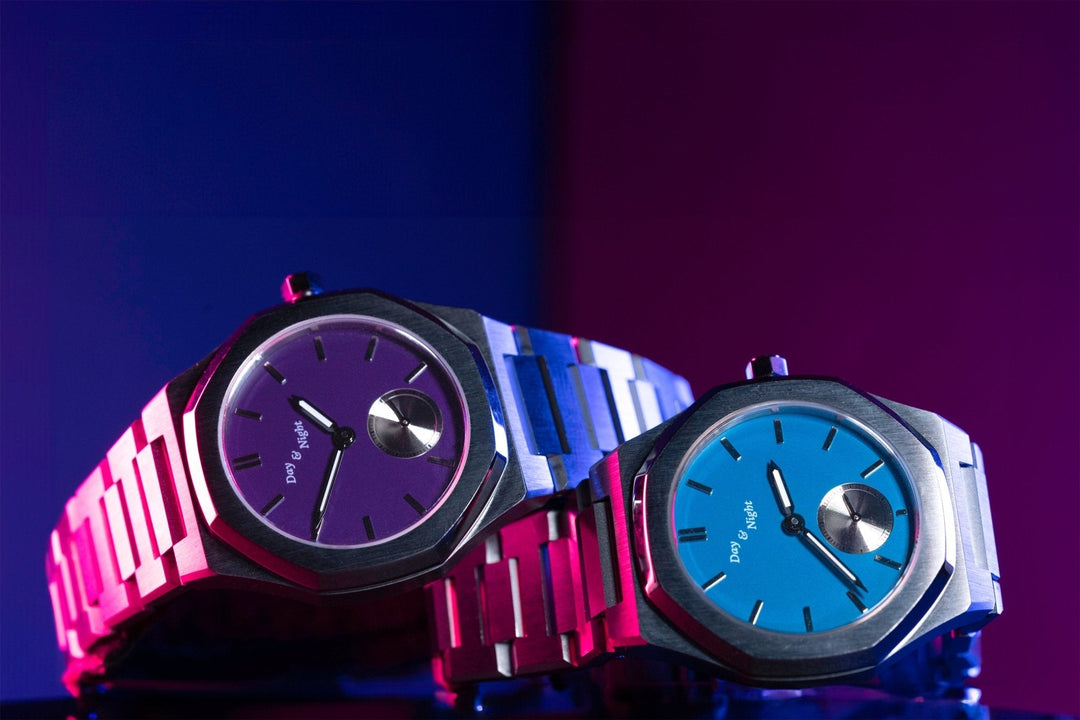 Modern Day and Night watch photographed on a textured surface highlighting craftsmanship