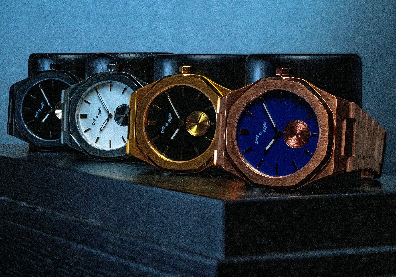 Variety of Day and Night watches laid out for guide overview