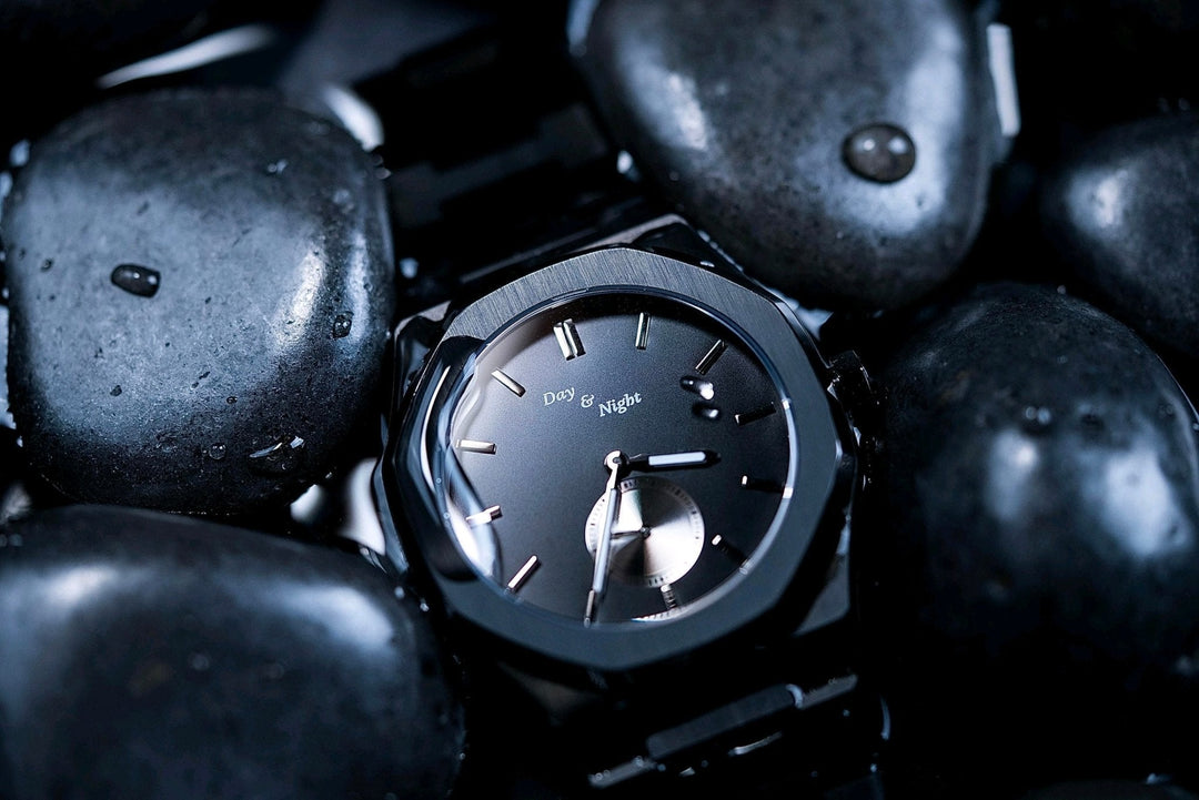 Day and Night Watch displayed with laptop and notebook symbolizing online watch shopping