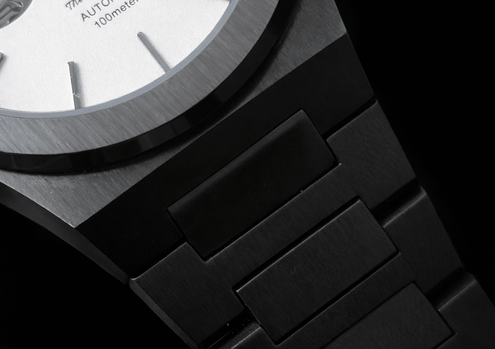 The Sango 878 Gunmetal Eclipse gunmetal dial watch on stainless steel bracelet
